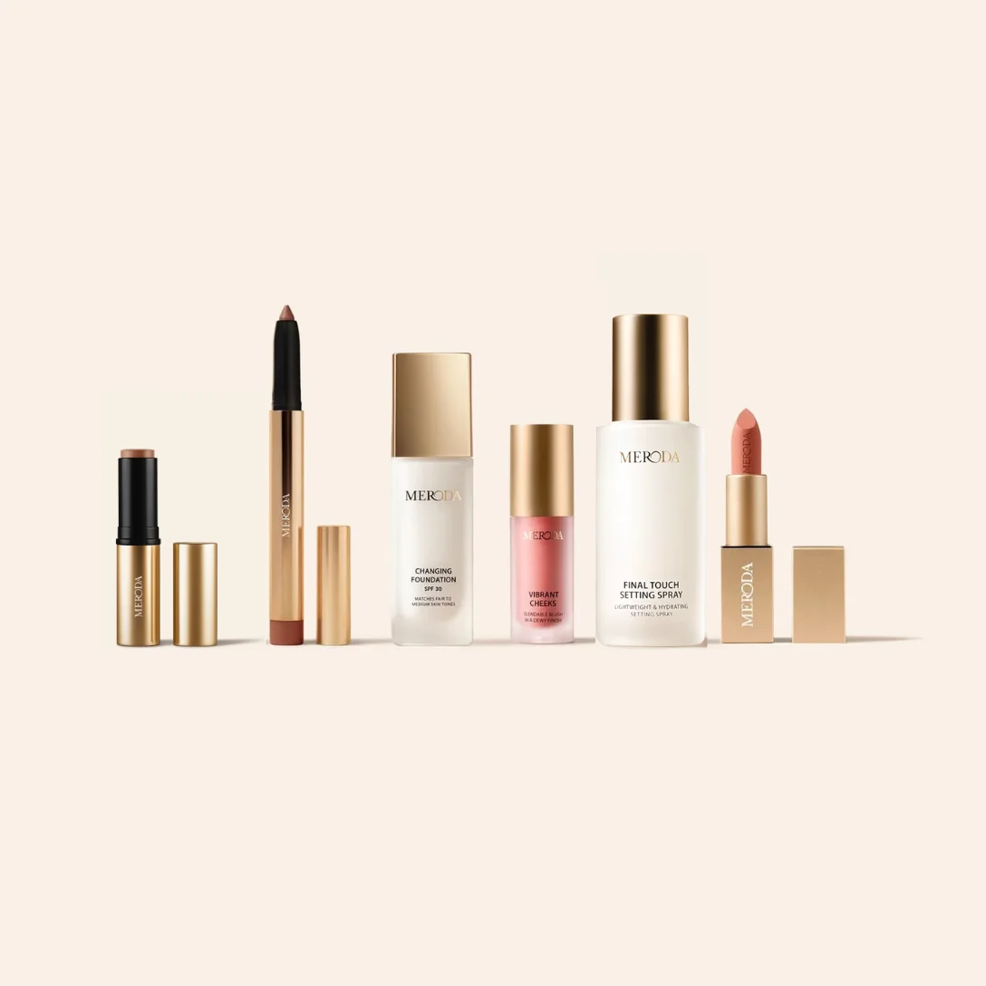 All-in-One Bundle featuring six Meroda makeup products with elegant gold accents on a minimalist light background.