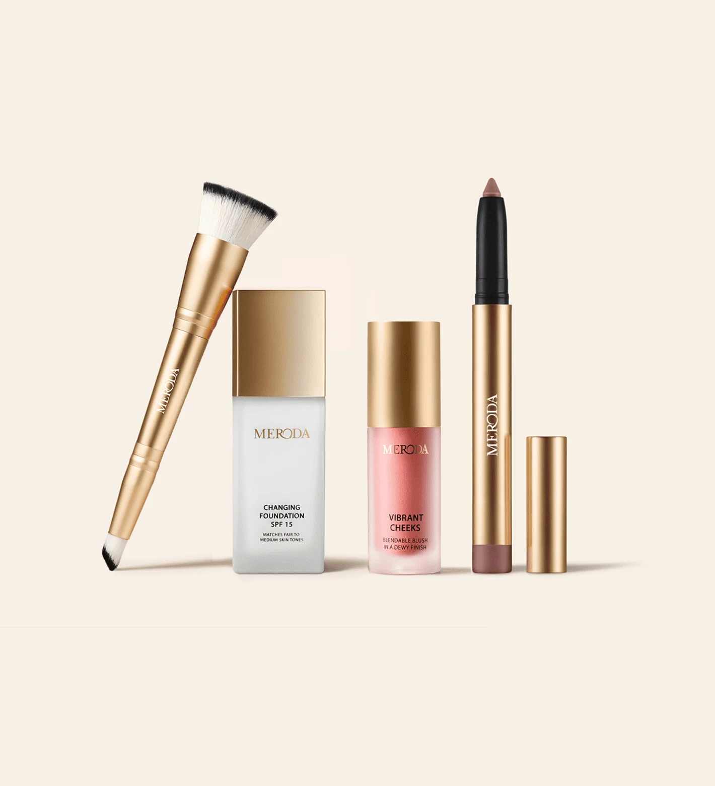 Meroda Cosmetics The Daily Routine Set: Changing Foundation, 2-in-1 brush, liquid blush and shimmer stick on light backdrop.