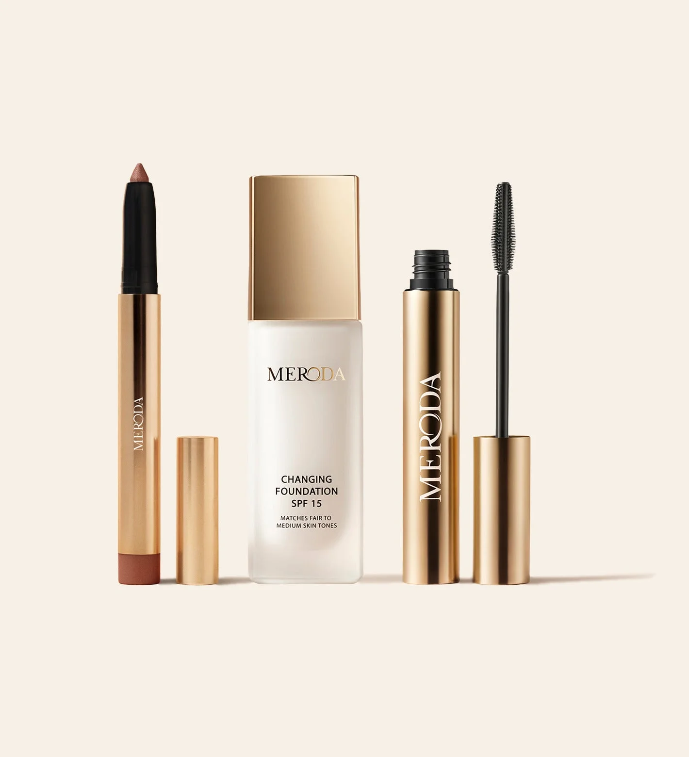 Meroda Cosmetics The Power Trio featuring Changing Foundation, Gilded Lashes Mascara and Eye Perfecting Shimmer Stick in Gold.