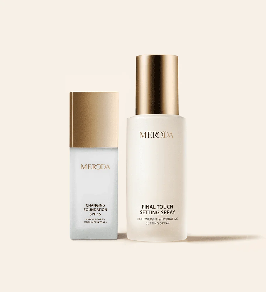 The Glow Getter featuring Changing Foundation and Final Touch Setting Spray in minimalist white bottles with gold caps