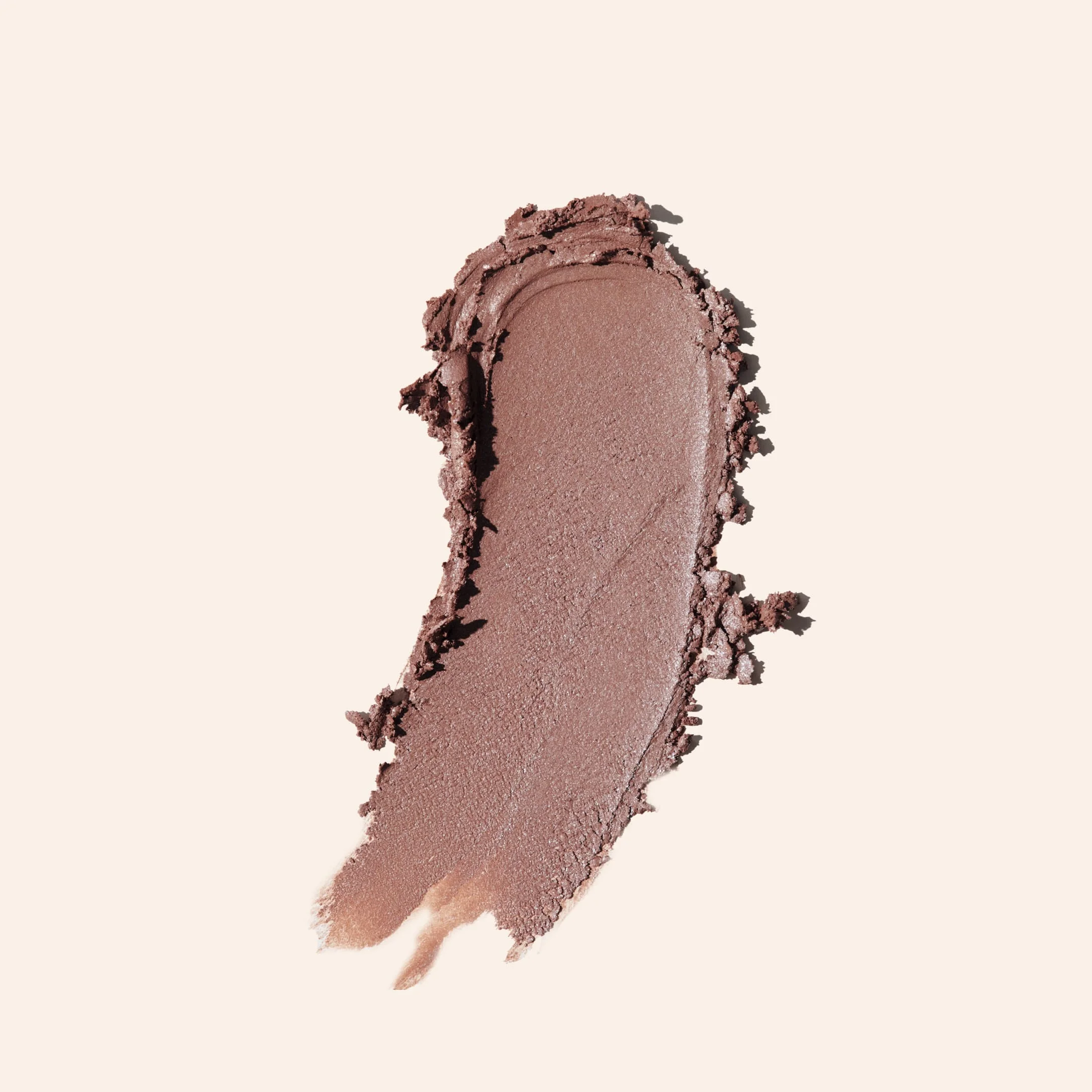 Mauve Eye Perfecting Shimmer Stick texture swatch highlighting its creamy, light-reflecting formula.