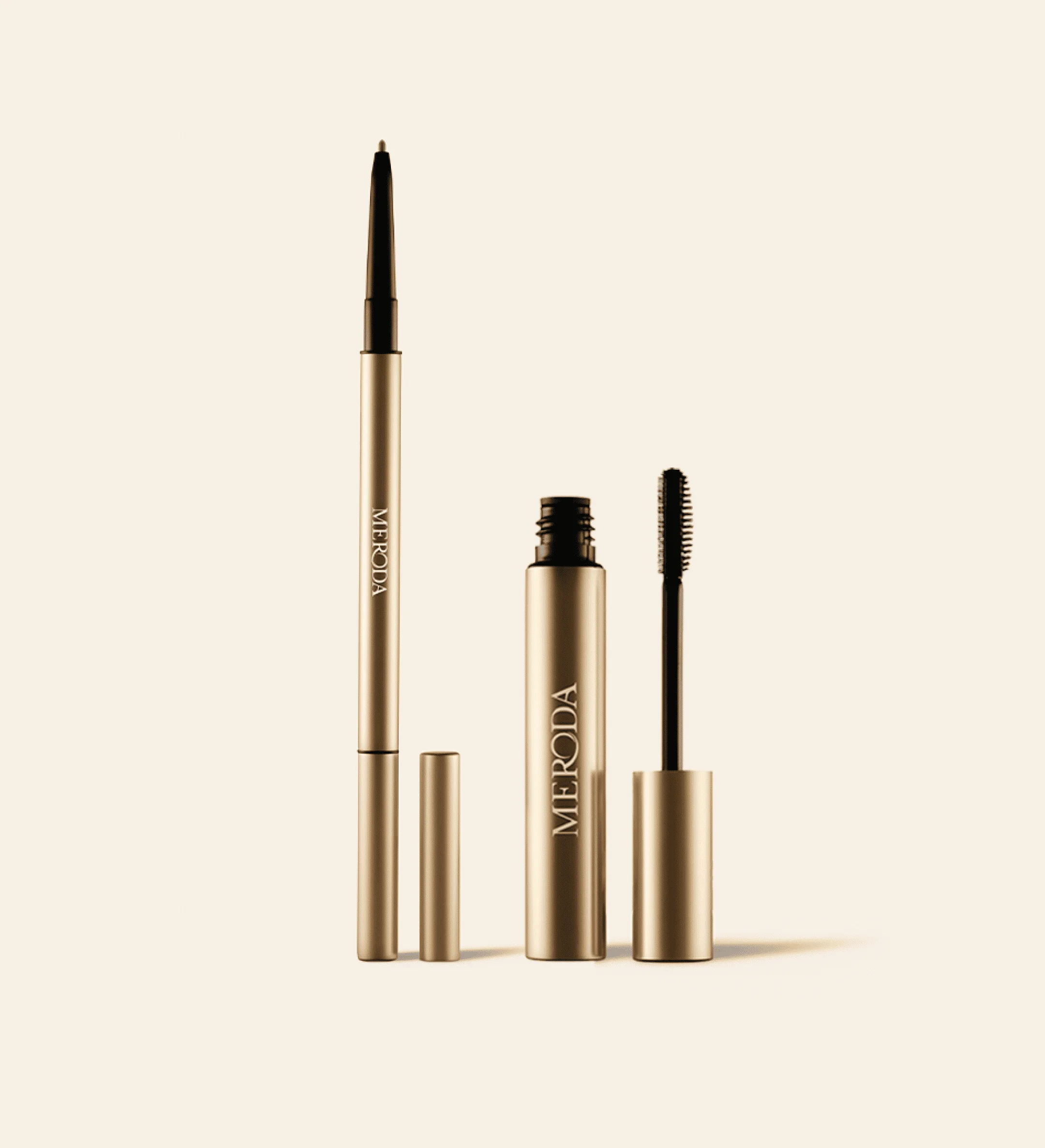 The Brow Defining Duo featuring The Precision Brow Pencil and Gel in sleek gold metallic casing by Meroda Cosmetics