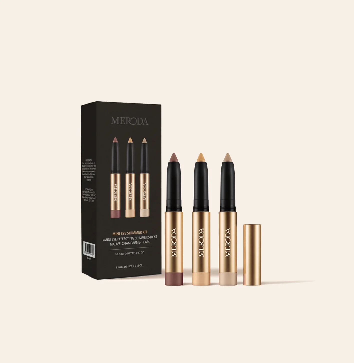 Meroda Cosmetics Mini Eye Shimmer Set featuring sticks in Mauve, Champagne and Pearl beside a black branded box