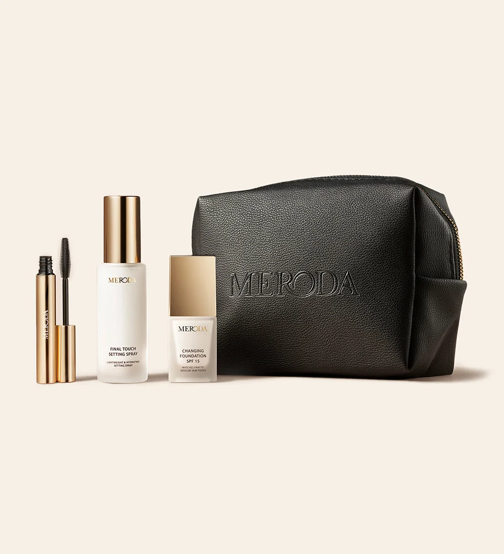 Meroda Cosmetics Travel Kit: mini Changing Foundation, Final Touch Setting Spray, Gilded Lashes Mascara and black travel bag.