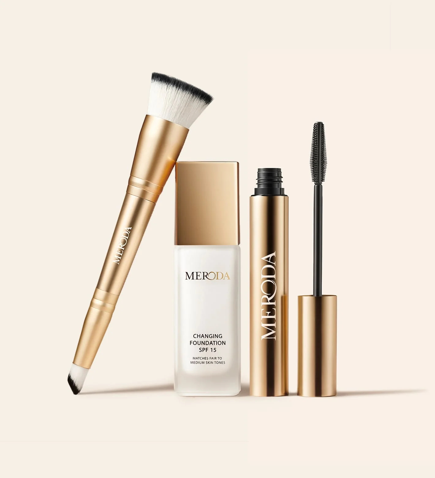 The Meroda Starter Set featuring gold Changing Foundation SPF 15, Gilded Lashes Mascara and 2-in-1 Build & Conceal Brush