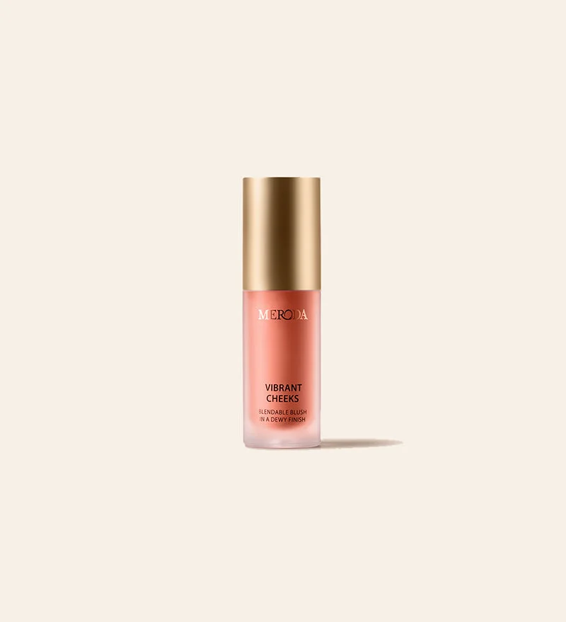 Meroda Cosmetics Mini Vibrant Cheeks Liquid Blush in a dewy orange shade featuring a brushed gold cap.